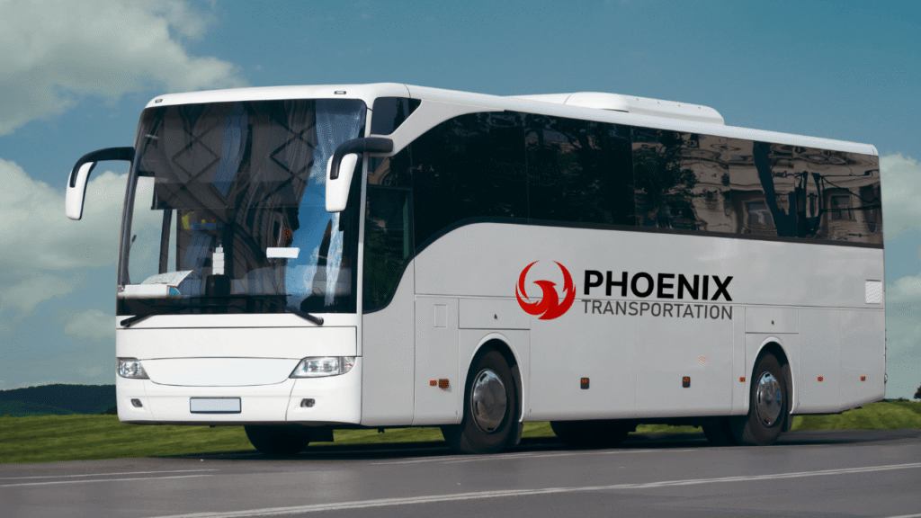 White Bus in the Road with Phoenix Tranportation Logo