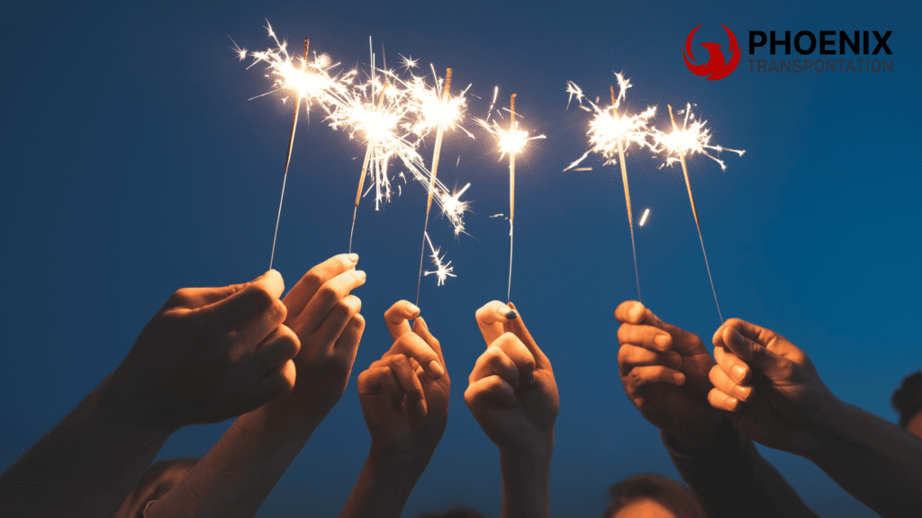Group of friends lighting fireworks in New Year