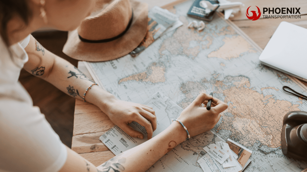 A tattooed traveler planning bus travel to Jack London Square on a world map with tickets, passport, and camera nearby.