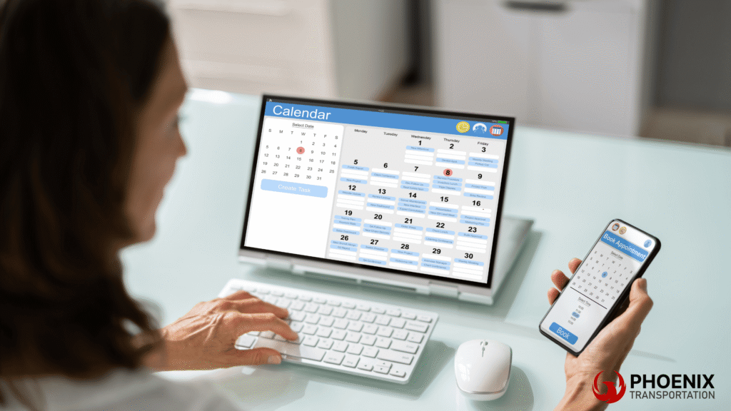 A women checking schedule on her laptop and smartphone for booking on a 56-passenger motorcoah in Berkeley for her big group.
